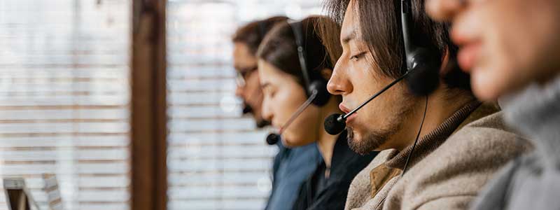 agents in a call center for credit union regulatory compliance blog post