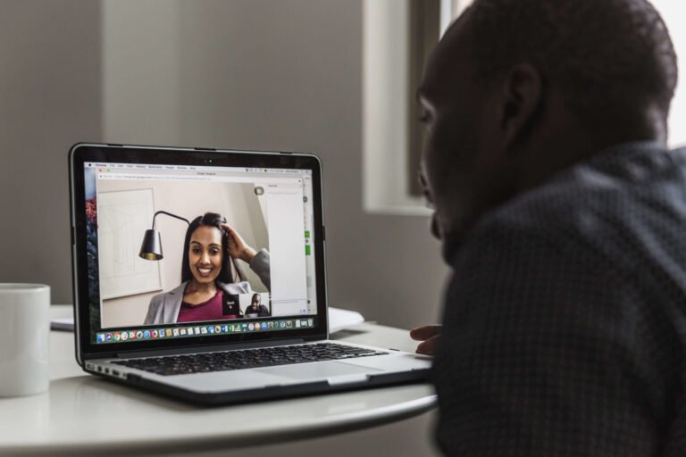 coworkers on video call showing remote call center monitoring situation