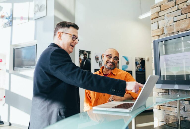 sales person taking with a customer to demonstrate emotion analysis