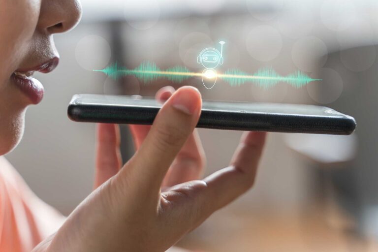 woman holding phone and sound wave graphic