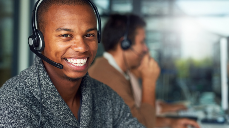 happy, productive call center agent smiling